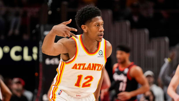 Atlanta Hawks forward De'Andre Hunter reacts after making a shot against the Portland Trail Blazers.